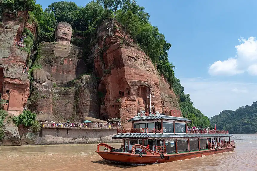 Tourists viewing Leshan Giant Buddha from ship